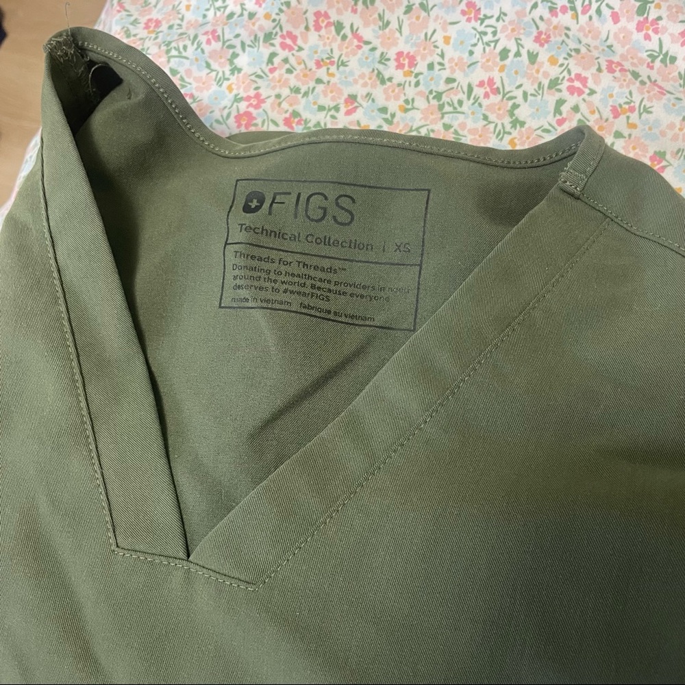 Figs green top. Size x small. Willing to bundle with pants!